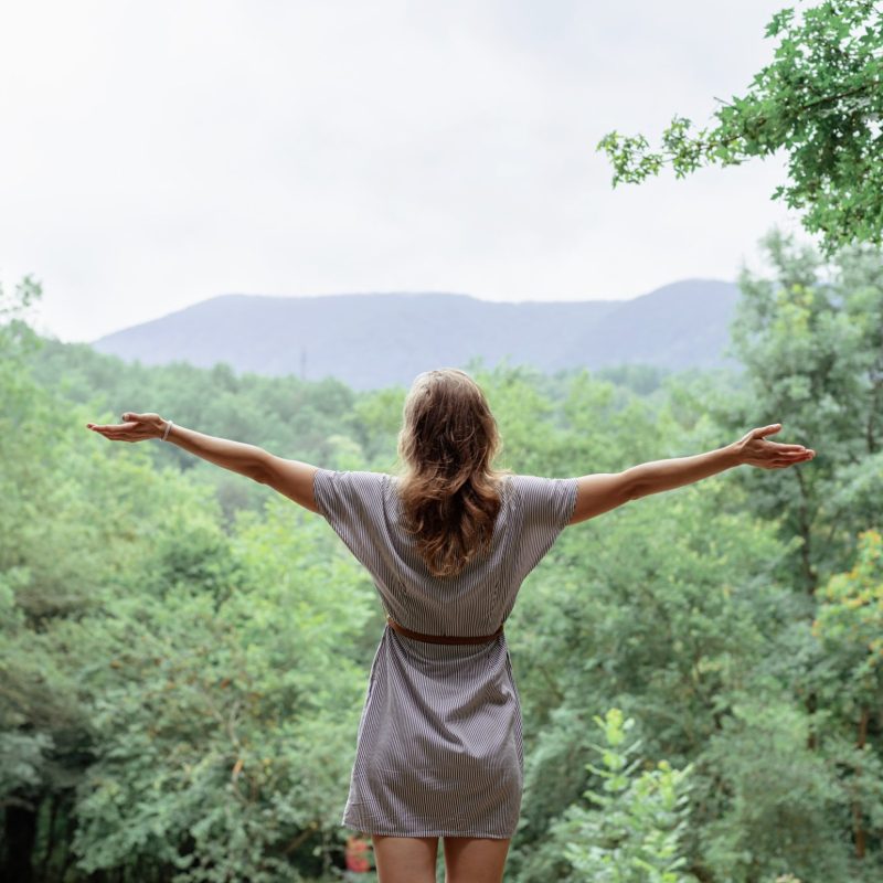 woman-standing-with-outstretched-hands-enjoying-th-2025-03-17-01-33-11-utc woman-standing-with-outstretched-hands-enjoying-th-2025-03-17-01-33-11-utc